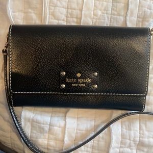 Black Kate spade wristlet with shoulder strap